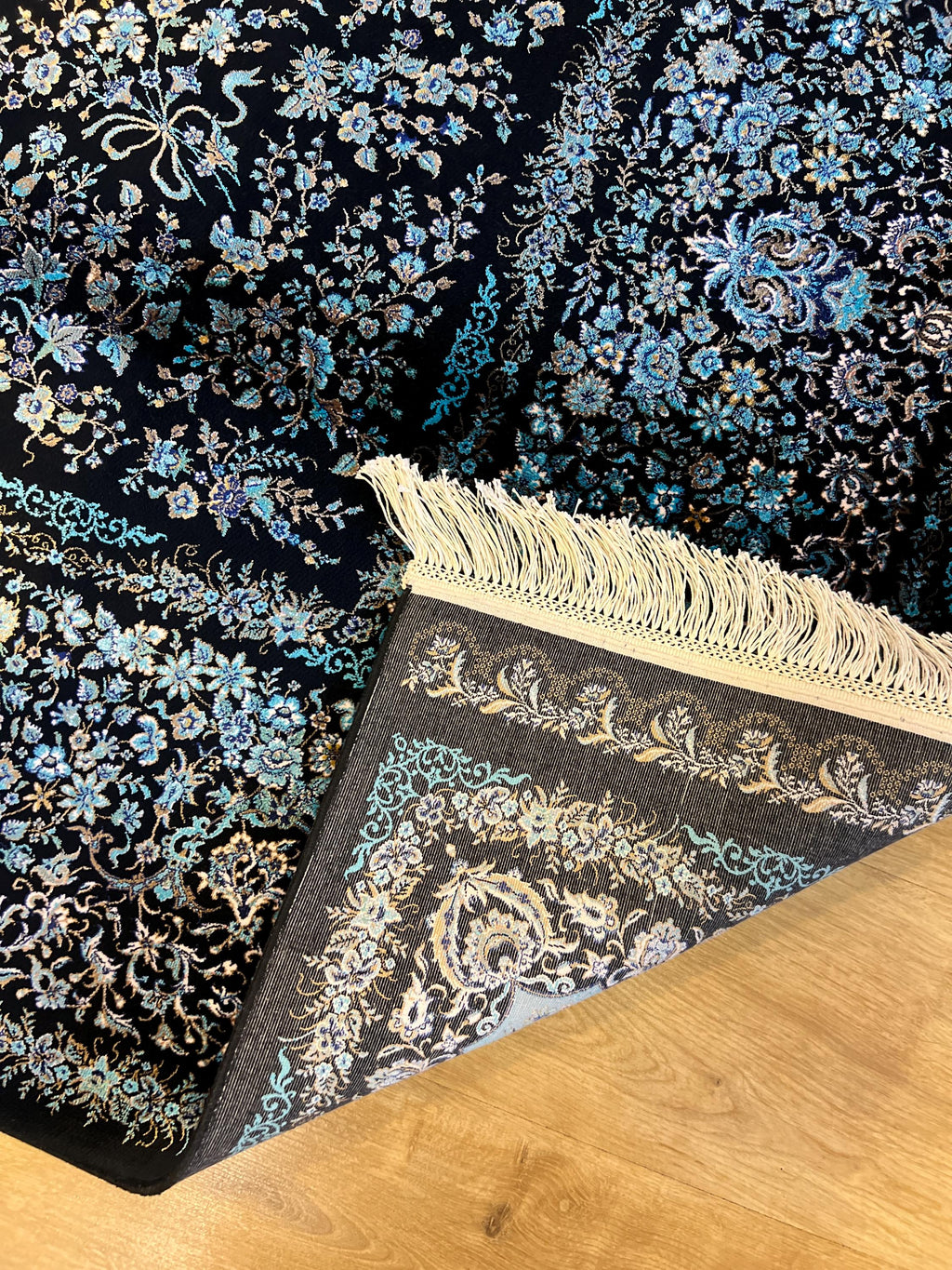 7x10 ft Elegant Silk Rug, Black Ground with Refined Blue Motifs