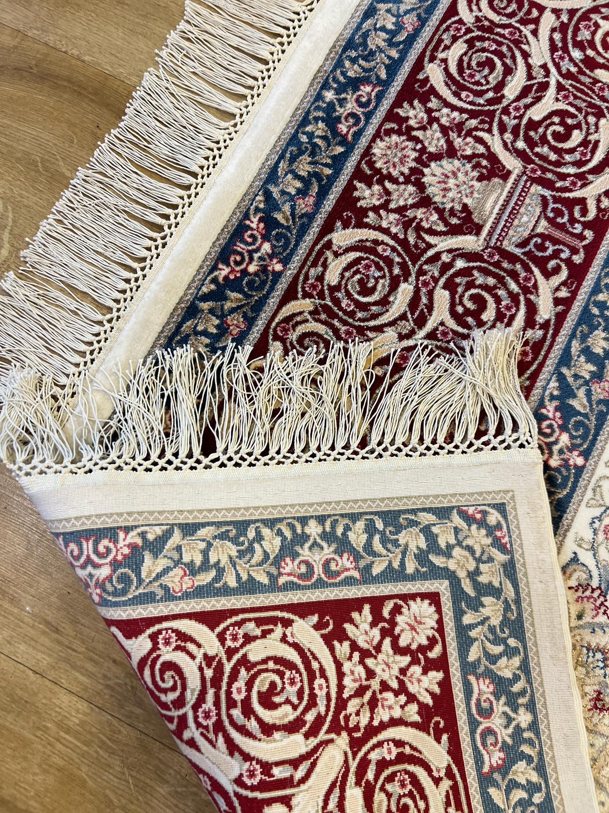 7x10 ft Cream Silk Rug with Red Blue Medallion and Border
