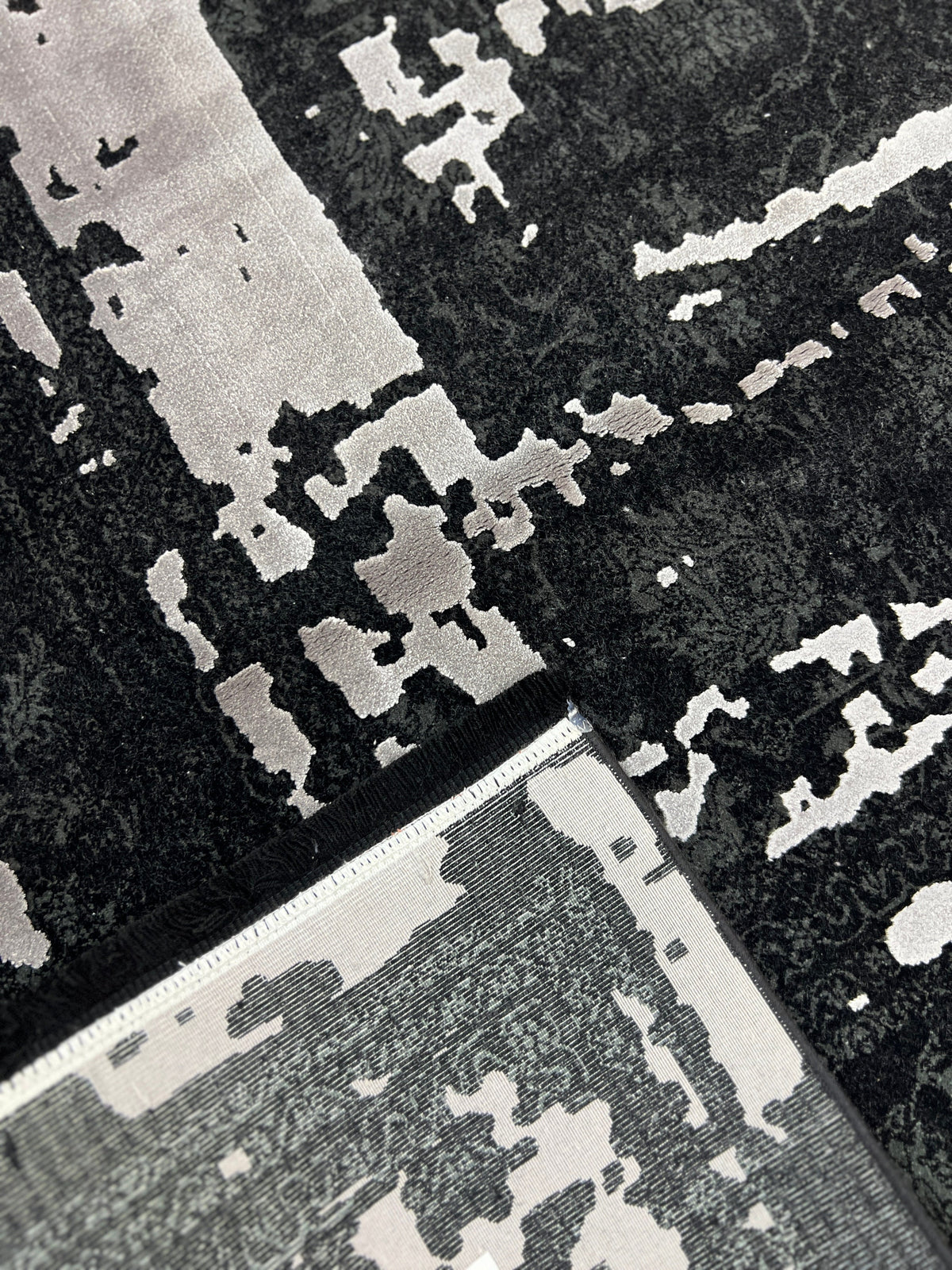 7x10 Ft Black Ethnic Distressed Bamboo Rug with Gray Modern Lines
