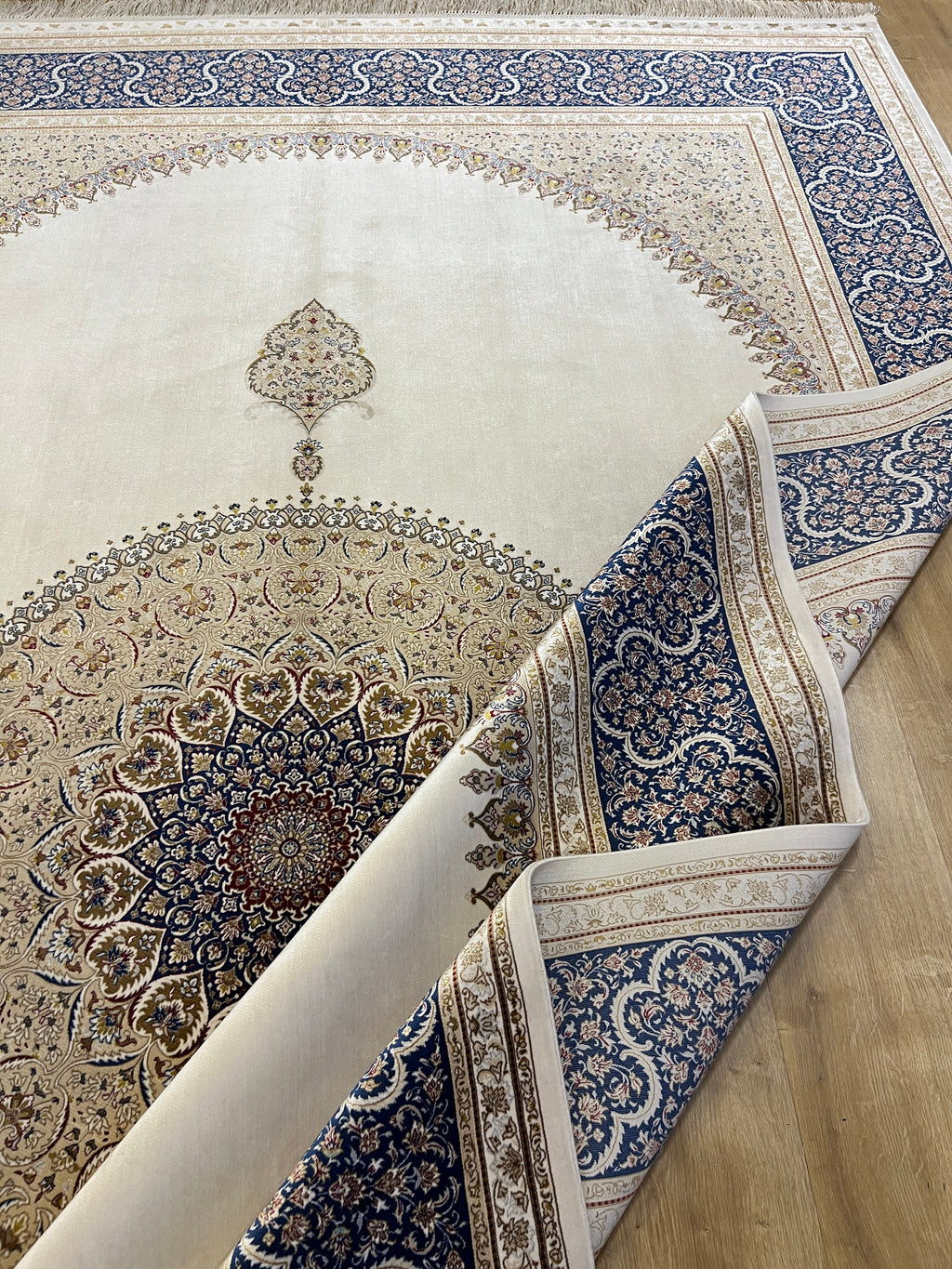 7x10 ft Ivory Silk Rug, Navy Border with Gold Medallion Design