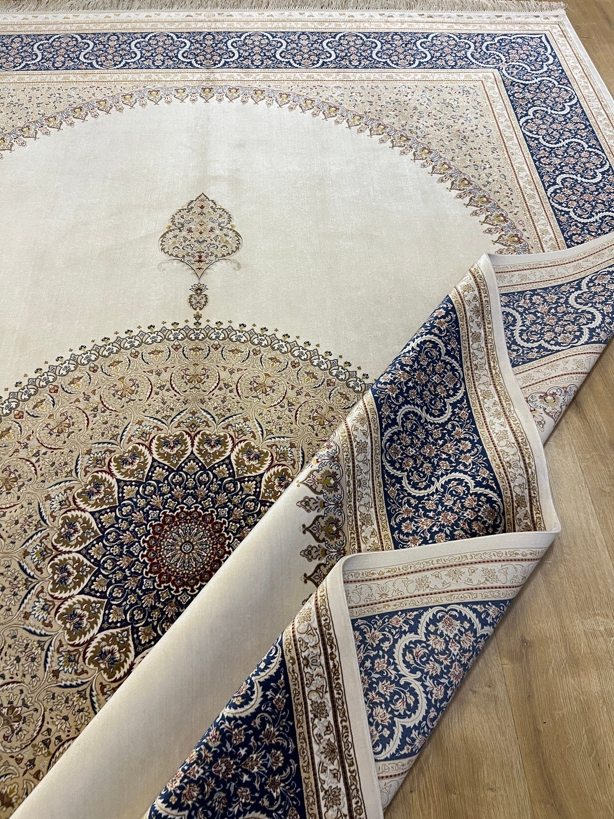 7x10 ft Ivory Silk Rug, Navy Border with Gold Medallion Design