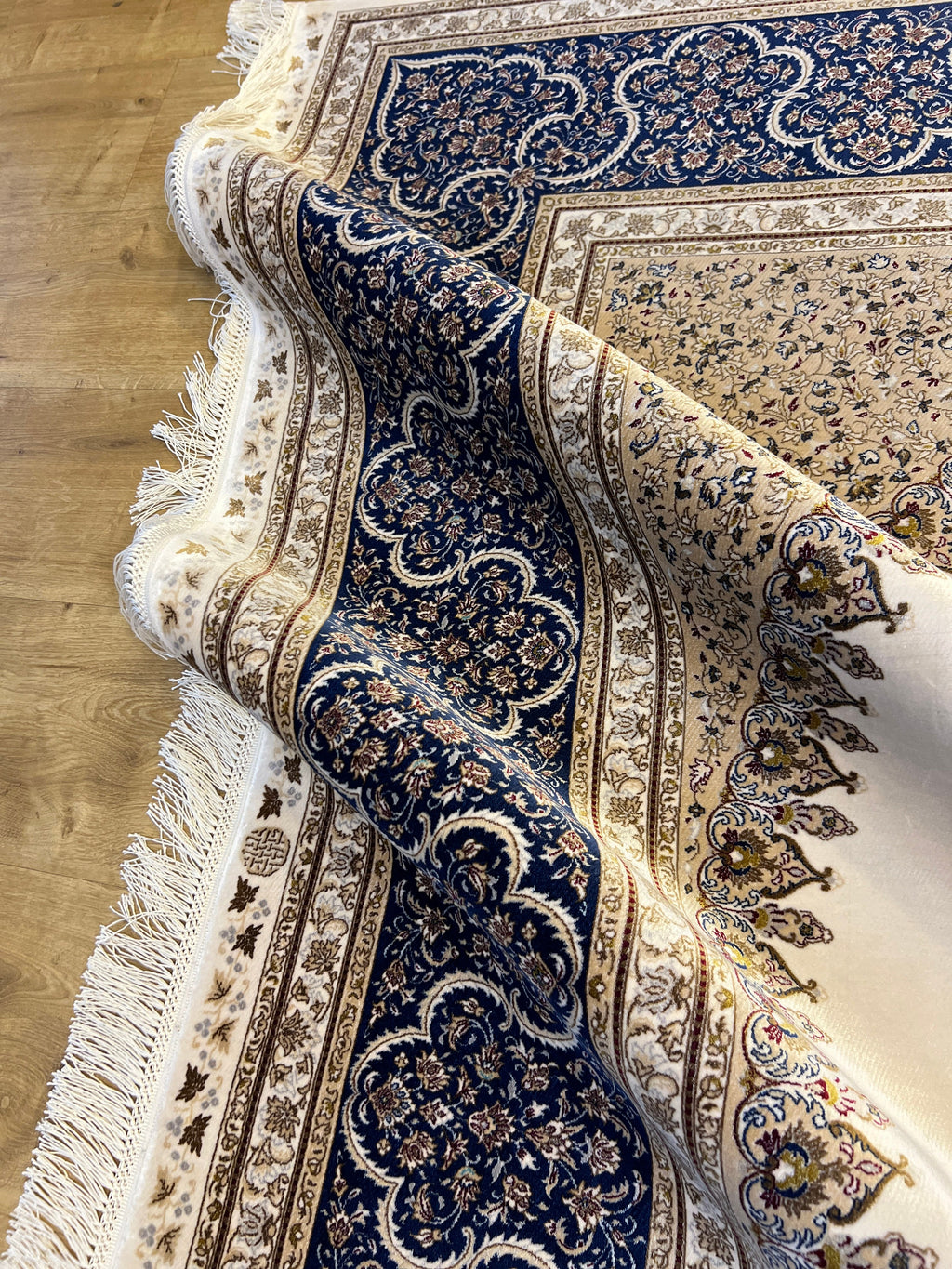7x10 ft Ivory Silk Rug, Navy Border with Gold Medallion Design