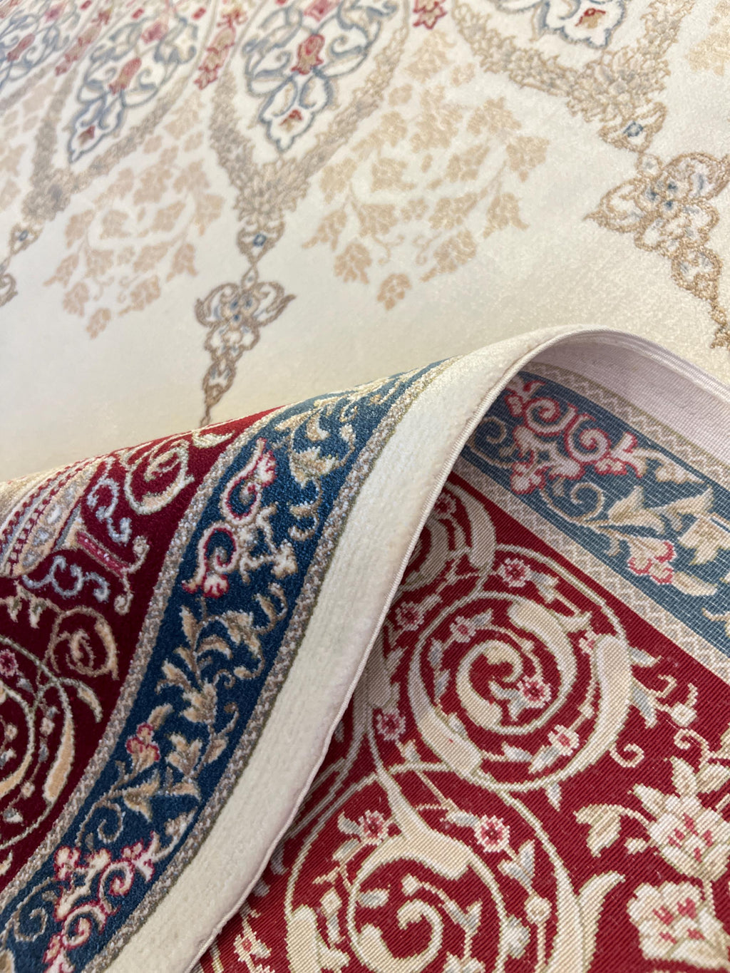 7x10 ft Cream Silk Rug with Red Blue Medallion and Border