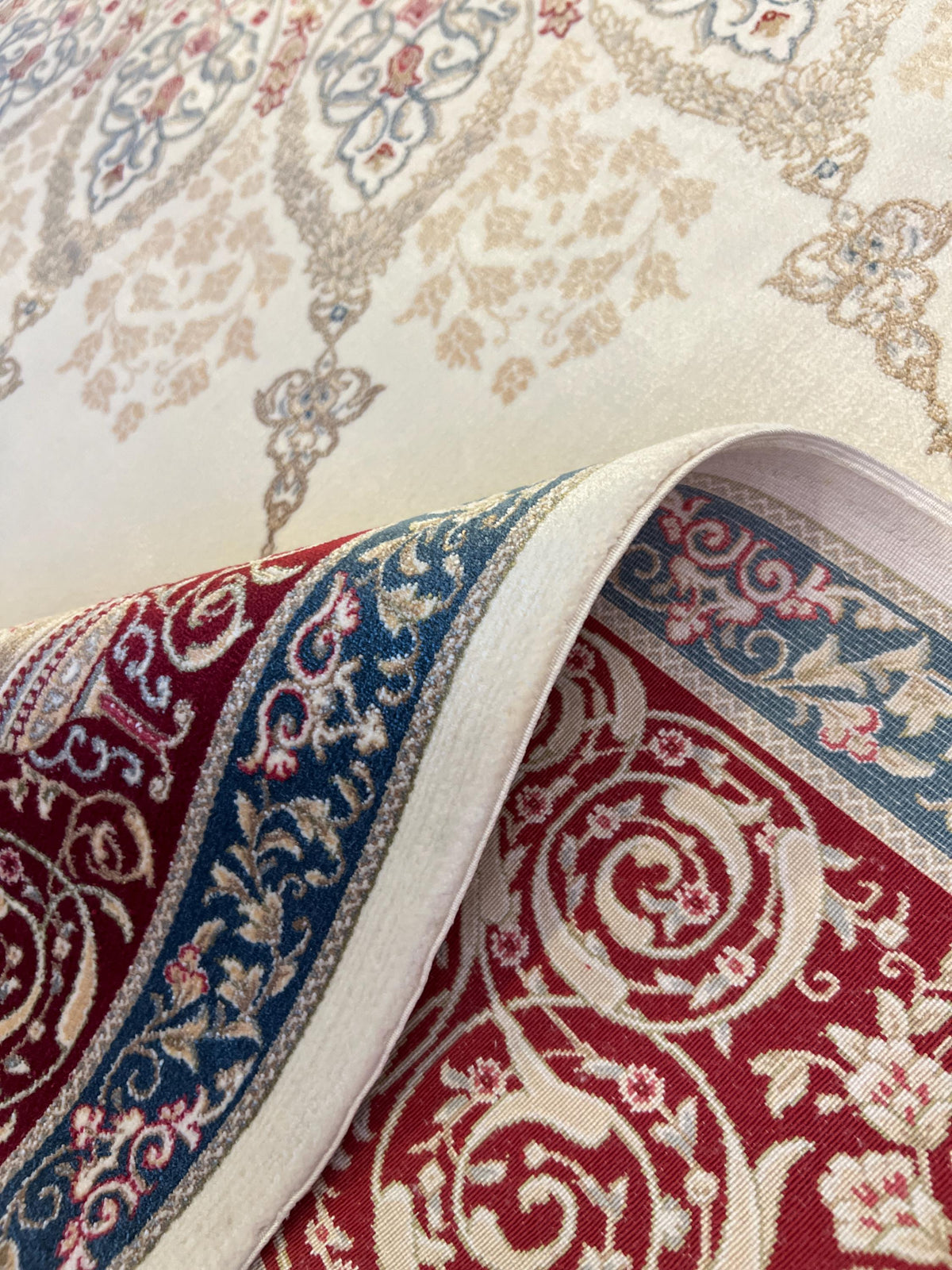 7x10 ft Cream Silk Rug with Red Blue Medallion and Border