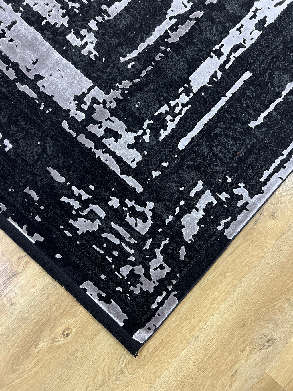 7x10 Ft Black Ethnic Distressed Bamboo Rug with Gray Modern Lines